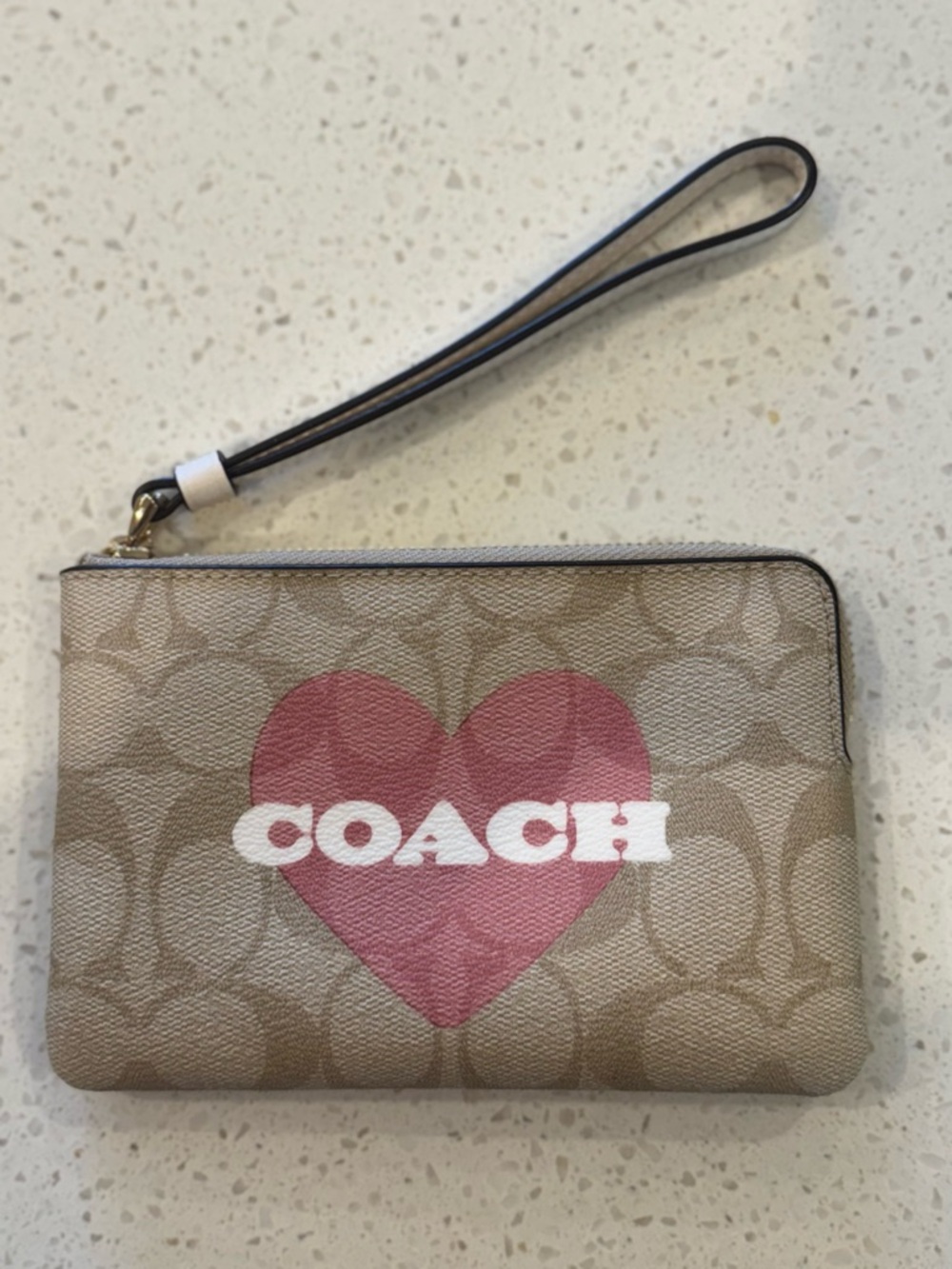 Coach Tan Monogram Wristlet with Pink Heart